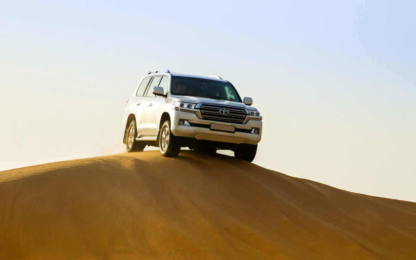 Cars With the Longest Production Runs of All Time: toyota land curiser in desert