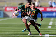 Shilton van Wyk of South Africa runs with the ball during the 2023 HSBC Sevens match between South Africa and Canada at FMG Stadium on January 21, 2023 in Hamilton, New Zealand.