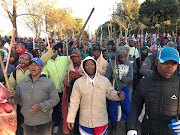 Striking grooms block the entrance to Summerveld ahead of the Vodacom Durban July.