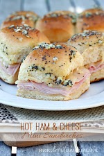 Hot Ham and Cheese Mini Sandwiches was pinched from <a href="http://www.letsdishrecipes.com/2010/01/hot-ham-and-cheese-mini-sandwiches.html" target="_blank">www.letsdishrecipes.com.</a>