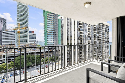 View of skyscrapers from a balcony in this luxury apartment / penthouse for sale in Miami ($670,000)
