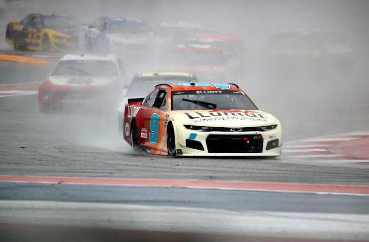 Chase Elliott, driver of the #9 Llumar Chevrolet, leads the field during the NASCAR Cup Series EchoPark Texas Grand Prix at Circuit of The Americas on May 23 2021 in Austin, Texas.