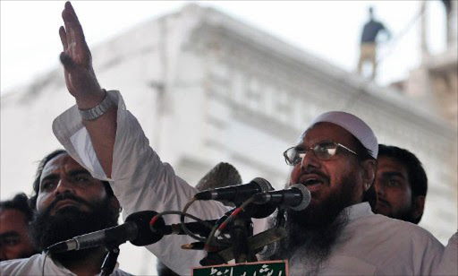 Hafiz Mohammad Saeed, leader of Pakistan's outlawed Islamic hardline organisation Jamaat ud Dawa (JD), addresses a crowd during an anti-US protest rally in Lahore on May 15, 2011. File photo.