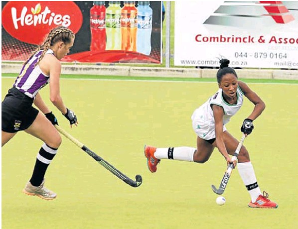 Pearson’s Izaiah April, right, goes on a run in the hockey match against Outeniqua in George on Saturday