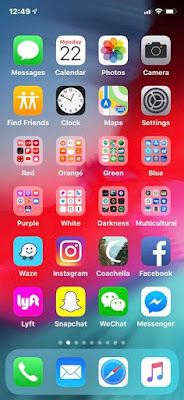 How to organize your phone: iPhone apps arranged by color.