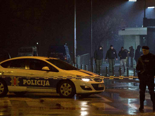 Police guard the entrance to the United States embassy building in Podgorica, Montenegro, February 22, 2018. /REUTERS