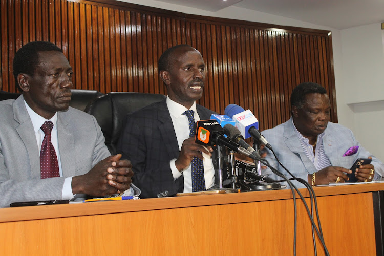 Knut vice chairman Collins Oyuu, secretary general Wilson Sossion and Cotu secretary general Francis Atwoli after a reconciliation meeting at Knut headquaters in Nairobi on October 24.