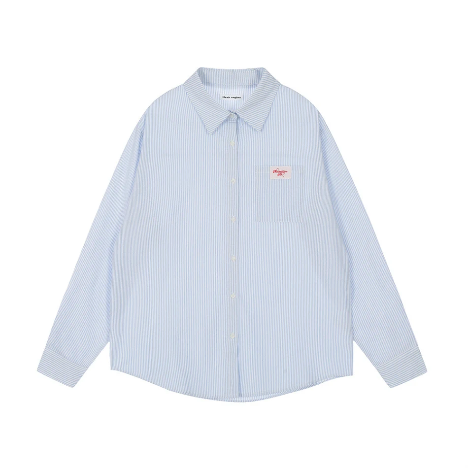Chemise ample à rayures pour hommes et femmes. Confort et style décontracté. Idéale pour un look casual ou élégant. Matière respirante et polyvalente.