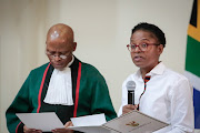 Khumbudzo Ntshavheni is sworn in as Minister of Small Business Development by Chief Justice Mogoeng Mogoeng.  