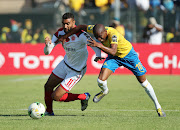 Ismail El Haddad of Wydad challenged by Anele Ngcongca of Sundowns during the 2018/19 CAF Champions League football match between Sundowns and Wydad Casablanca at Lucas Moripe Stadium, Pretoria on 04 May 2019.