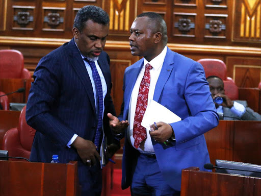 Director of Public Prosecution Noordin Haji (L) with Director of Criminal Investigations George Kinoti reacts when he appeared before Senate Justice and Legal affairs committee on the progress made in the multii-agency fight against corruption and economic crimes. August 29, 2018. Photo/Jack Owuor