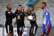 Thembinkosi Lorch (right) of Orlando Pirates celebrates a goal with teammates Ben Motswhwari (left) and Kwame Peprah in the DStv Premiership match against Maritzburg United at the Orlando Stadium on May 24 2022.