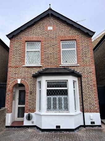 Full paint removal on Victorian Cottage and re pointed in pure sand and lime album cover