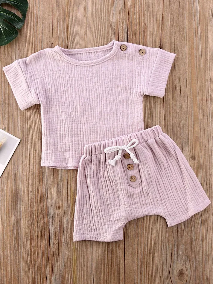 Baby Kurzarm-Shorts aus Gauze, lässige Homewear, atmungsaktiv und leicht für warme Tage. Bequem und perfekt für Babys.