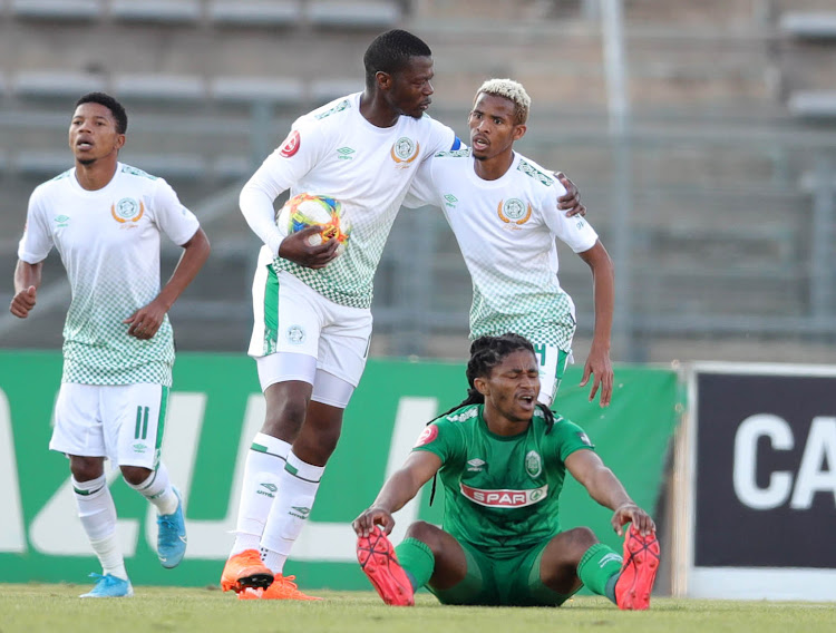 Ndumiso Mabena celebrates with a teammate after scoring.