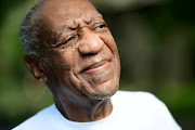 Bill Cosby looks on outside his house after Pennsylvania's highest court overturned his sexual assault conviction and ordered him released from prison immediately, in Elkins Park, Pennsylvania, US June 30, 2021. 