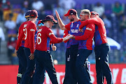 Liam Livingstone of England celebrates the wicket of Mushfiqur Rahim of Bangladesh during the ICC Men's T20 World Cup match between England and Bangladesh at Sheikh Zayed stadium on October 27, 2021 in Abu Dhabi, United Arab Emirates.