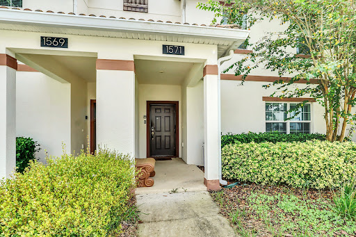 Modern townhouse facade exterior in this luxury house for sale in Davenport ($355,000)