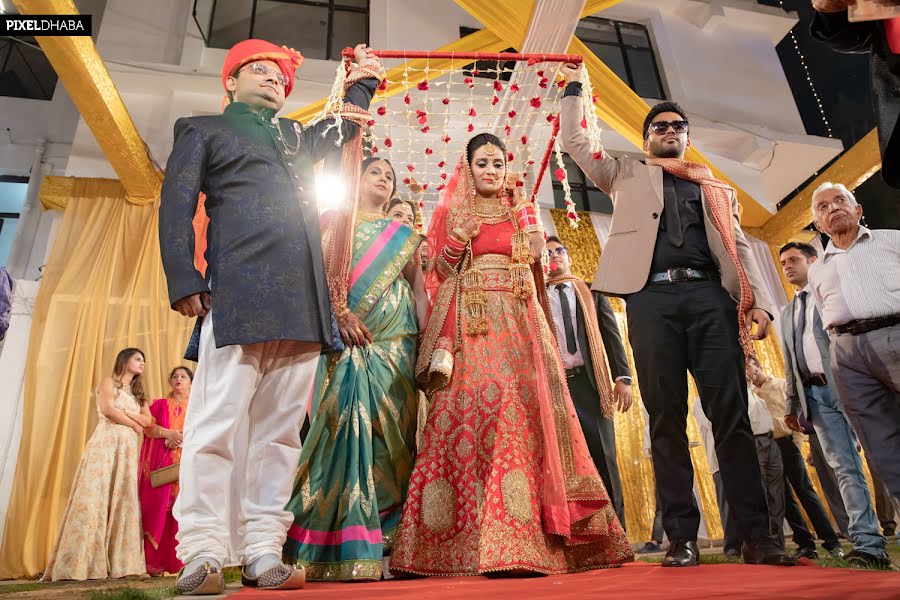 Esküvői fotós Veeresh Pathania (pixeldhabakullu). Készítés ideje: 2020 december 9.