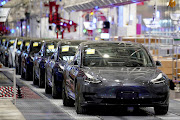 Tesla China-made Model 3 vehicles during a delivery event at the carmaker's factory in Shanghai, China January. REUTERS/Aly Song/File Photo