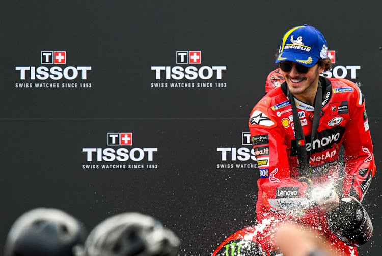 Francesco Bagnaia won the season-opening Portuguese Grand Prix on Sunday to build a sizeable lead in the rider's championship with maximum points after winning the sprint a day earlier.