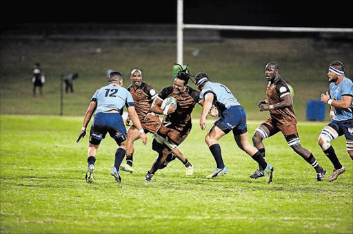 FLYING FLANKER: Border’s Billy Dutton charges forward with the ball during the clash with the Blue Bulls Picture: MARK ANDREWS