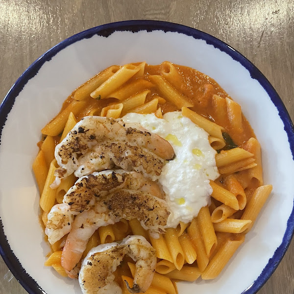 Penne (tomato arrabbiata stracciatella cheese, basil, olive oil) with shrimp