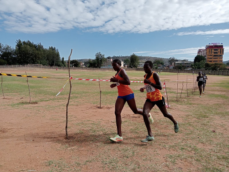 Zena Jemutai and Winny Kimutai on the lead during the senior women 10km race at the Kenyatta stadium in Maralal, Samburu County