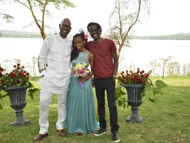 The late Bob Collymore with Wambui and Juliani.