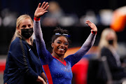 Simone Biles celebrates after competing on the floor at the U.S. Women's Olympic Gymnastics trials in St Louis, Missouri, U.S. on June 25, 2021.  