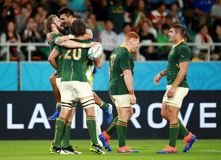 RG Snyman celebrates with teammates after scoring the Springbok’s sixth try during the Rugby World Cup 2019 Group B game between South Africa and Italy.