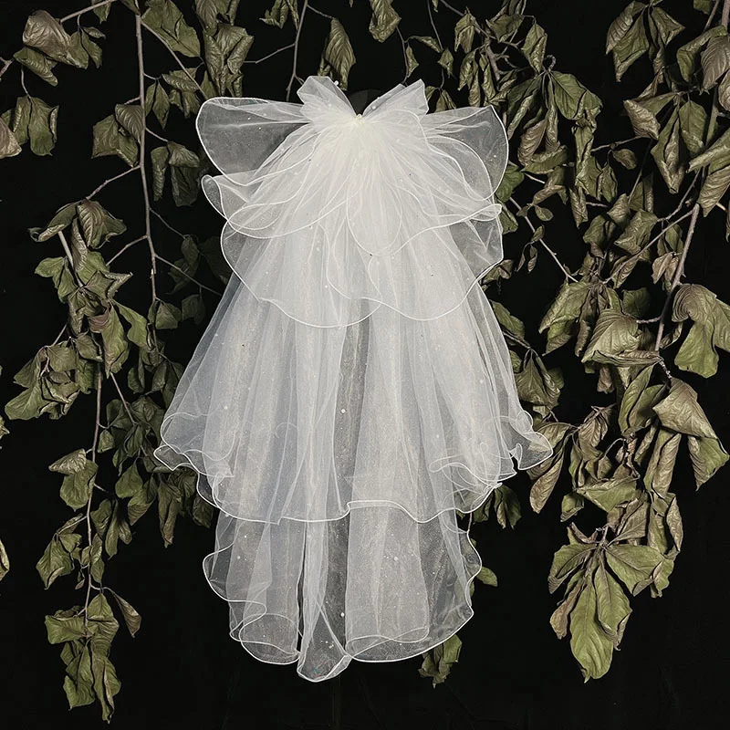 Ladies Puffy Thin and Glittering Little Bride Wedding Photo Veil. Adds a touch of sparkle and elegance for stunning wedd