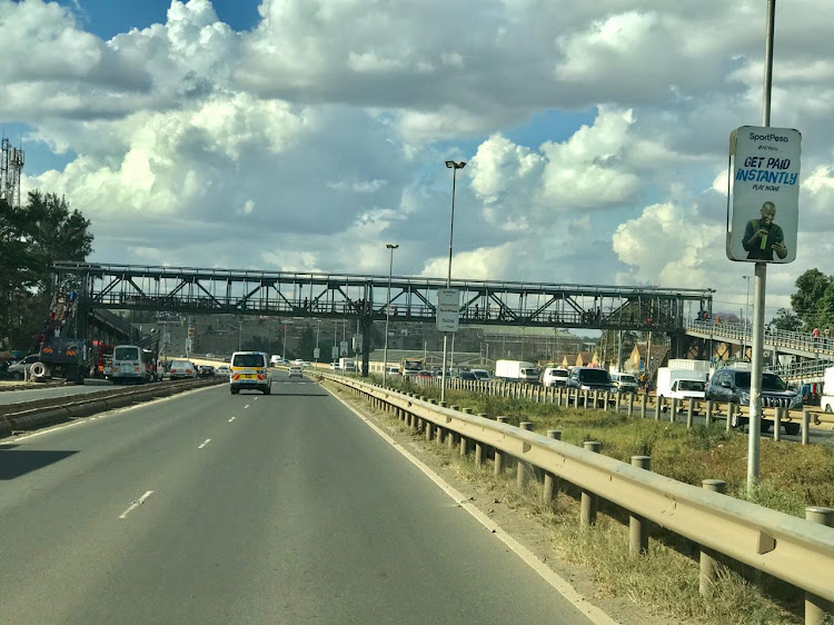 A section of OuterRing Road with the Huruma footbridge in the background.