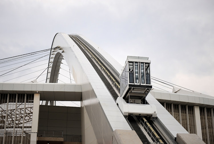 The SkyCar lift moves up the arch of Moses Mabhida Stadium in Durban when it was still working.