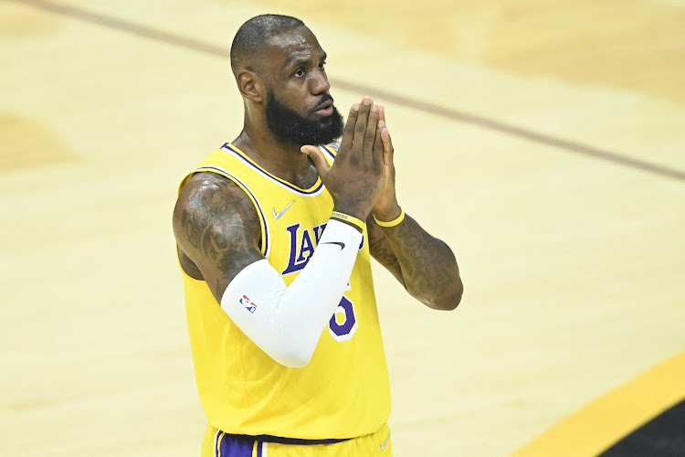 Los Angeles Lakers forward LeBron James (6) reacts to cheers in the first quarter against the Cleveland Cavaliers at Rocket Mortgage FieldHouse.