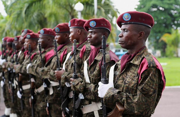 Members of the Republican Guard stand in line to welcome Congolese President Felix Tshisekedi and his Kenyan counterpart, William Ruto, in Kinshasa, November 21 2022. Picture: REUTERS/JUSTIN MAKANGARA