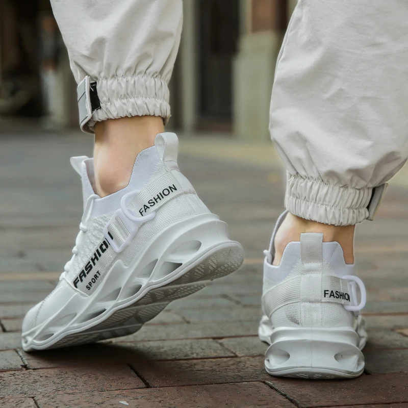 Baskets décontractées en mesh tissé volant. Chaussures respirantes et légères pour homme et femme, idéales pour un usage quotidien.
