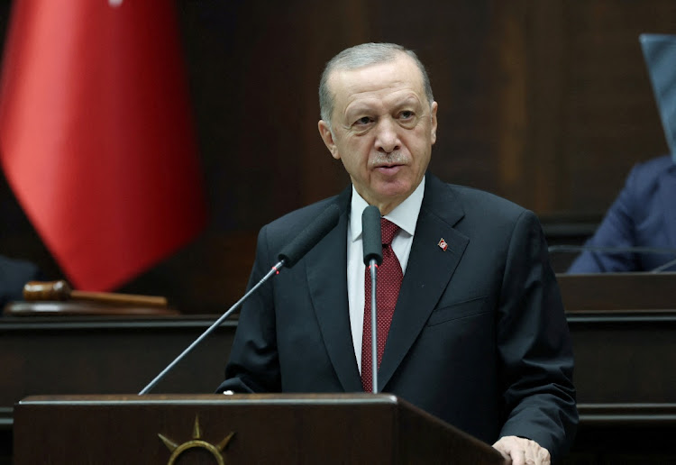 Turkey's president Tayyip Erdogan addresses lawmakers from his ruling AK Party at the Turkish Parliament in Ankara, Turkey, on October 11 2023. Delays in rebuilding the southeast of the country after February's earthquake could play a role in a nationwide local vote in March, when the AK Party will seek to recover municipal governments in Istanbul, Ankara and other big cities lost to the opposition in 2019.