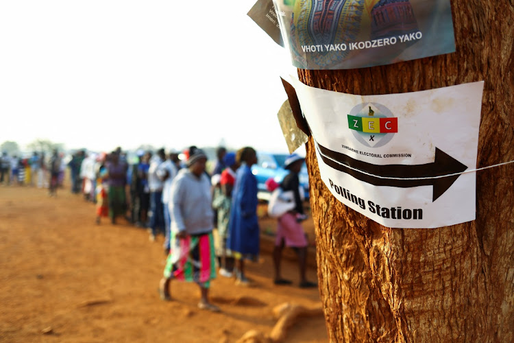 People wait to cast their vote during the Zimbabwe general elections in Kwekwe, Zimbabwe, on August 23 2023. Picture: REUTERS/SIPHIWE SIBEKO
