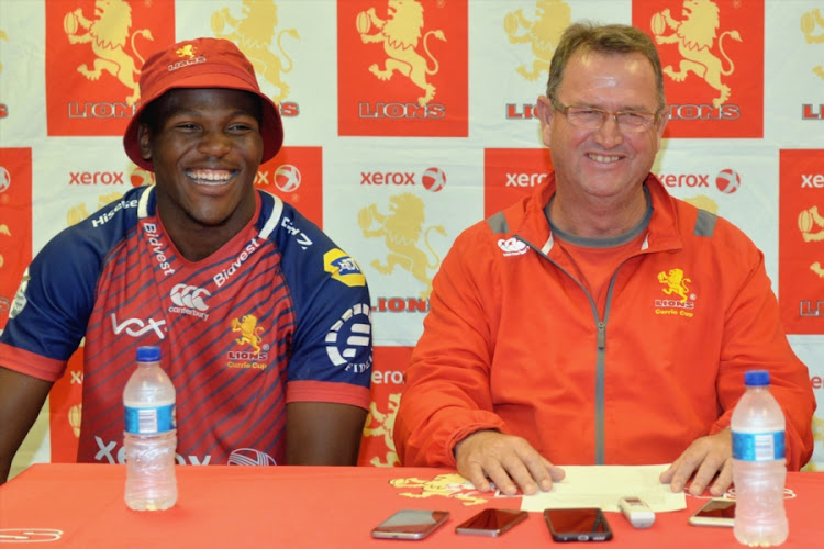 Hacjivah Dayimani and Swys de Bruin (Coach) during the Xerox Golden Lions Team Announcement at Emirates Airline Park on August 31, 2017 in Johannesburg, South Africa.