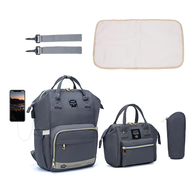 Multifunctionele handtas voor moeder en baby Driedelige rugzak. Ruimte en perfecte organisatie voor luiers, flessen en andere baby-benodigdheden