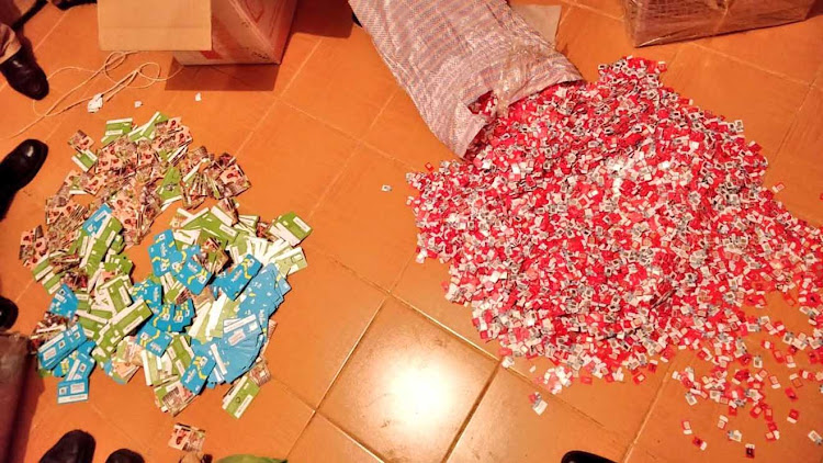 Hundreds of sim cards obtained from suspects arrested by DCI officers in Kasarani, Nairobi this year.