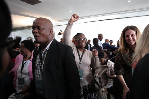 Family members celebrate, 19 March 2018, in Parktown, Johannesburg after Former Deputy Chief Justice Dikgang Moseneke ordered that the government pay R1.2 million to effected families. Picture: Alaister Russell/The Sunday Times