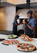 Saint's wood-fired ovens make all the difference. 