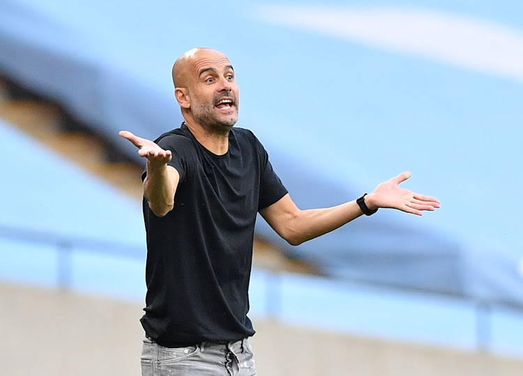 Manchester City manager Pep Guardiola reacts,