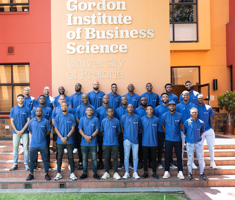 Swallows goalkepper Daniel Akpeyi with some of the PSL players who've enrolled for the second installment of the Player Transition Programme at Gibs.