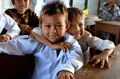 cambodia-schoolboy-friends.jpg - Cambodian schoolboys in a floating school along the Mekong River.