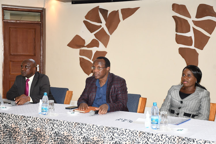 Professor Vincent Machuki, President William Ruto's Council of Economic Advisers chairman David Ndii and Higher Education and Research PS Beatrice Inyangala during the universities funding workshop attended by vice chancellors and principals of constituent colleges