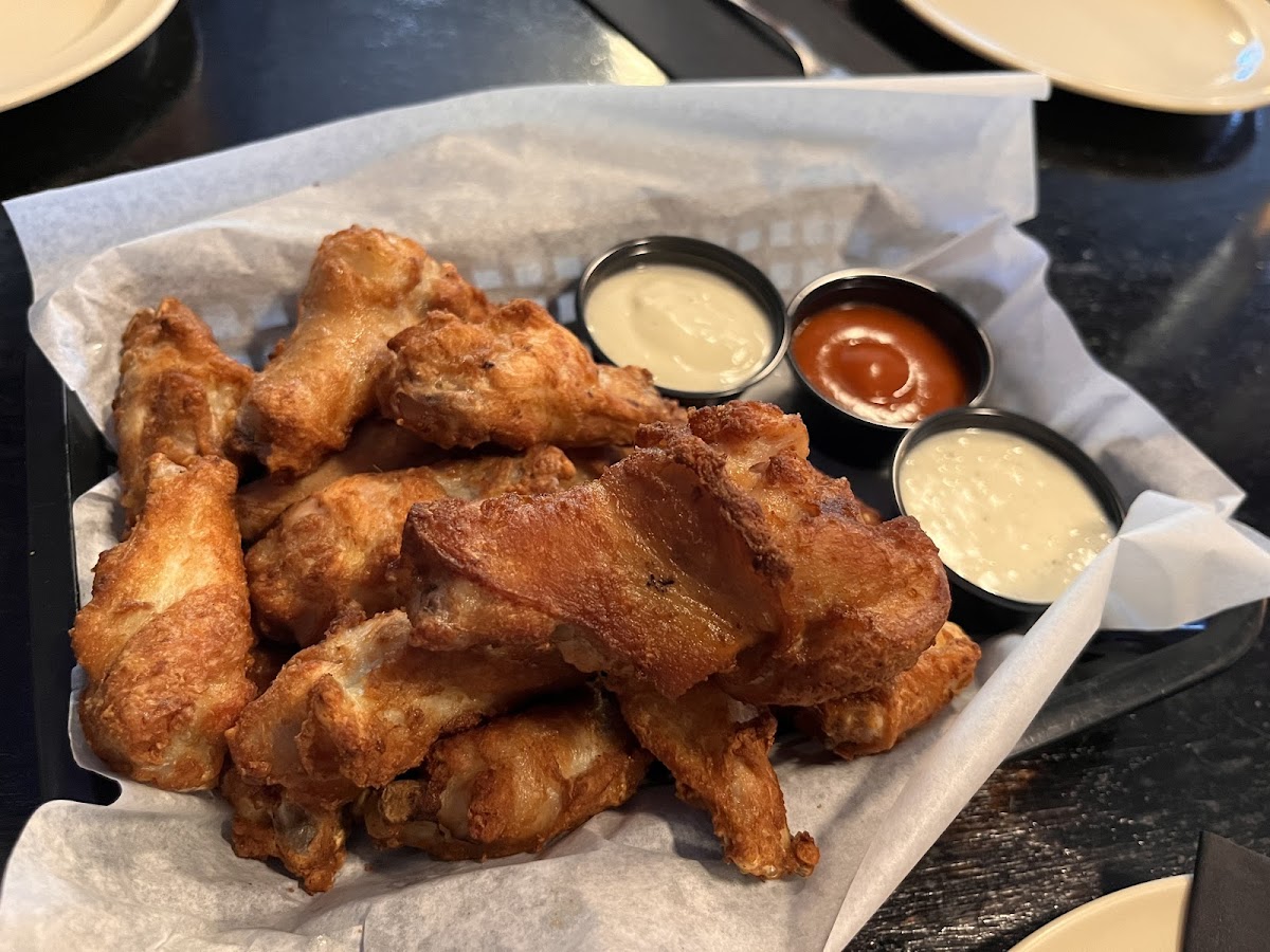 Celiac safe wings and sauces. The server knew which sauces were NOT GF so we could avoid them.