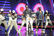 Rappers AKA and K.O perform on stage at the Channel O awards.